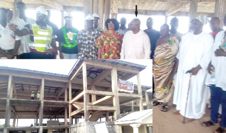 Akwasi Acquah (arrowed), the MP for Oda; Victoria Adu (5th from left), the MCE, and the staff of Setalexidan Company Limited, at the first floor of the abandoned building. INSET: The front view of the three-storey office accommodation building Akwasi Acquah (arrowed), the MP for Oda; Victoria Adu (5th from left), the MCE, and the staff of Setalexidan Company Limited, at the first floor of the abandoned building. INSET: The front view of the three-storey office accommodation building