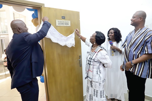 Moses Kwesi Baiden Jnr. (left), CEO, Margins Limited, together with Georgina Baiden (2nd from right), spouse of the late husband, unveiling the plaque to inaugurate the Moses Kweku Baiden Snr. Lecture Hall at the University of Ghana, Legon. With him is Prof. Raymond Atuguba (right), Dean of the Law Faculty. Picture: SAMUEL TEI ADANO Moses Kwesi Baiden Jnr. (left), CEO, Margins Limited, together with Georgina Baiden (2nd from right), spouse of the late husband, unveiling the plaque to inaugurate the Moses Kweku Baiden Snr. Lecture Hall at the University of Ghana, Legon. With him is Prof. Raymond Atuguba (right), Dean of the Law Faculty. Picture: SAMUEL TEI ADANO