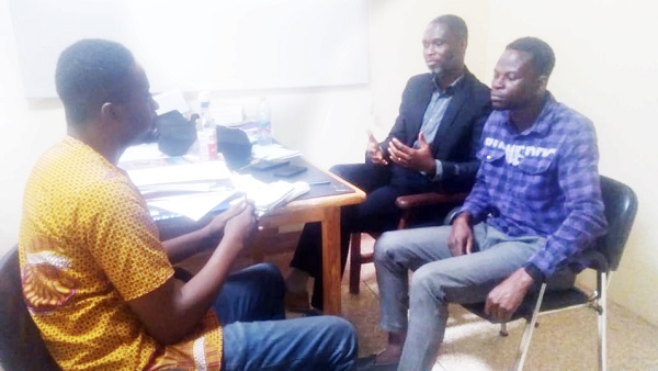 Dr Emmanuel Akatibo (middle) speaking in an interview with Gilbert Mawuli Agbey (left). Looking on is Ayamga Ayariga, a critical care nurse