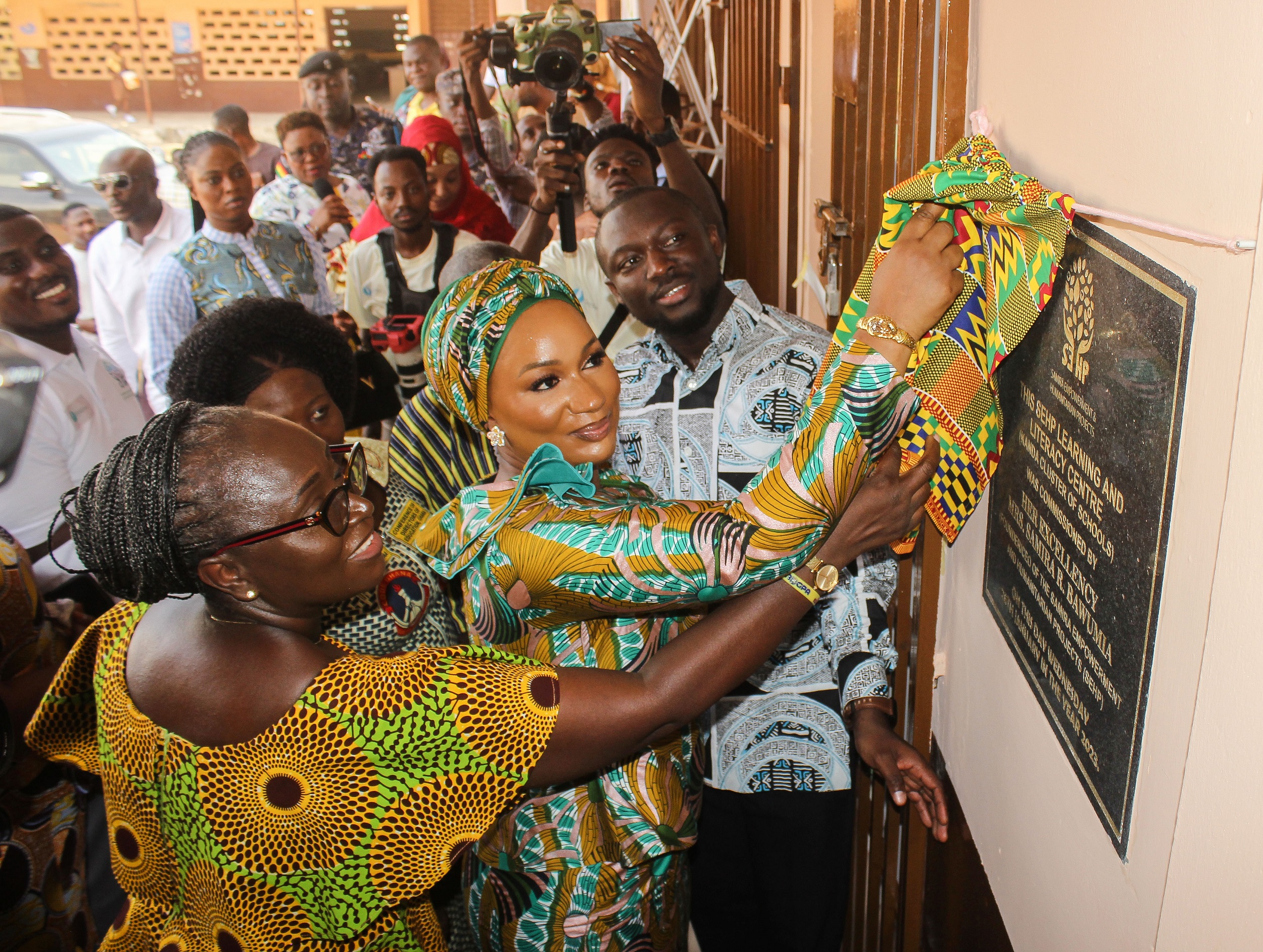 Samira Bawumiah (arrowed), Founder of SEHP, being assisted by Gifty Twum Ampofo (left), a Deputy Minister of Education, to unveil the plaque of the library, while Hayford Siaw (right), CEO, Ghana Library Authority, looks on. Picture: ERNEST KODZI Kanda Cluster of Schools gets library