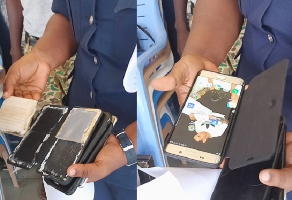 File photo: Man charged for selling packaged broken tiles as phones File photo: Man charged for selling packaged broken tiles as phones