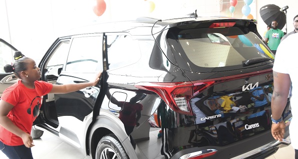 A young girl admiring one of Rana Motors’ newly assembled Carens cars. Picture: EBOW HANSON A young girl admiring one of Rana Motors’ newly assembled Carens cars. Picture: EBOW HANSON