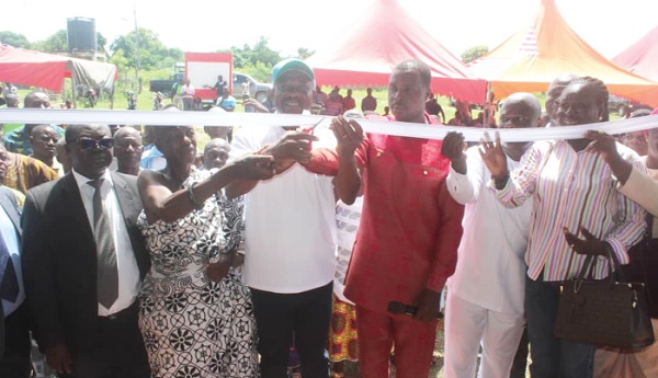 Samuel Kofi Ahiave Dzamesi (3rd from left), Chief Executive Officer of BPA, being assisted by Ahmed Ibrahim (2nd from right), Banda MP; Dr Kofi Amo-Kodieh (left), Bono Regional Director of Health and Emmanuel Akonneh (3rd from right), Banda DCE to inaugurate the facility Samuel Kofi Ahiave Dzamesi (3rd from left), Chief Executive Officer of BPA, being assisted by Ahmed Ibrahim (2nd from right), Banda MP; Dr Kofi Amo-Kodieh (left), Bono Regional Director of Health and Emmanuel Akonneh (3rd from right), Banda DCE to inaugurate the facility