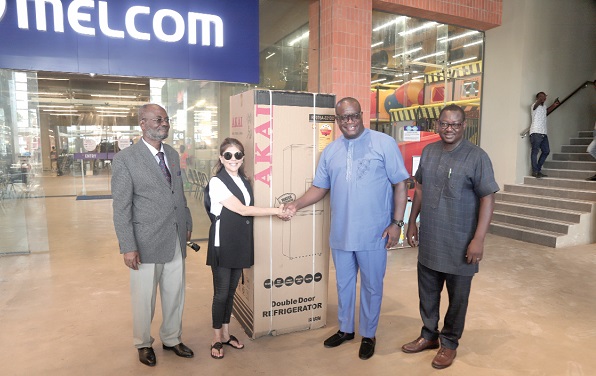 Theophilus Yartey (2nd from right), Editor, Graphic, receiving the refrigerator from Sonya Sadhwani, Group Executive Director, Melcom Group. With them are Godwin Avenorgbo (left), the Group Director of Communications of Melcom, and Samuel Doe Ablordeppey, the News Editor, Daily Graphic Theophilus Yartey (2nd from right), Editor, Graphic, receiving the refrigerator from Sonya Sadhwani, Group Executive Director, Melcom Group. With them are Godwin Avenorgbo (left), the Group Director of Communications of Melcom, and Samuel Doe Ablordeppey, the News Editor, Daily Graphic