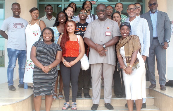 Theophilus Yartey (2nd from right — front row), Editor, Graphic, with the delegation from the Hilltop Global Group during the visit to Graphic. Picture: ESTHER ADJORKOR ADJEI