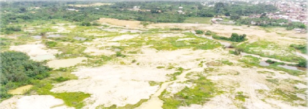 An aerial shot of tracts of degraded lands yet to be reclaimed at Antobia in the Western North Region. Credit: Daily Graphic