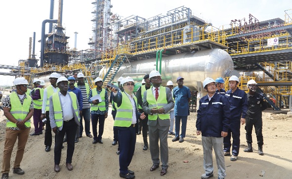Xu Gingguang (arrowed), Group Chairman, Sentuo Oil Refinery, briefing Kobina Tahir Hammond, Minister of Trade and Industry, on the operations of the facility during the tour in Tema. Picture: SAMUEL TEI ADANO Xu Gingguang (arrowed), Group Chairman, Sentuo Oil Refinery, briefing Kobina Tahir Hammond, Minister of Trade and Industry, on the operations of the facility during the tour in Tema. Picture: SAMUEL TEI ADANO