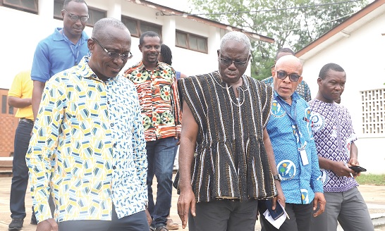 Emmanuel Ofoe Fiemawhle (3rd from right), Headmaster of Accra Academy Senior High School, explaining a point to Kofi Agyarko (left), Director, Renewable and Energy Efficiency, Energy Commission, after the event. With them are Edwin Tamakole (2nd from right), Senior Officer, Energy Efficiency Regulations, Energy Commission, and other officials of Accra Academy Senior High School and the Energy Commission. Picture: EDNA SALVO-KOTEY Emmanuel Ofoe Fiemawhle (3rd from right), Headmaster of Accra Academy Senior High School, explaining a point to Kofi Agyarko (left), Director, Renewable and Energy Efficiency, Energy Commission, after the event. With them are Edwin Tamakole (2nd from right), Senior Officer, Energy Efficiency Regulations, Energy Commission, and other officials of Accra Academy Senior High School and the Energy Commission. Picture: EDNA SALVO-KOTEY