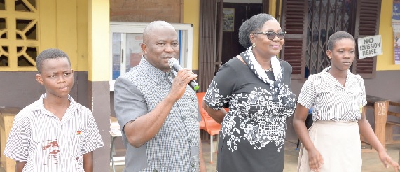 Alexander Akwasi Acquah (2nd from left) addressing some of the candidates during the tour. With him are Esther Quaye-Sowah (2nd from right), the Municipal Director of Education, and some BECE candidates Alexander Akwasi Acquah (2nd from left) addressing some of the candidates during the tour. With him are Esther Quaye-Sowah (2nd from right), the Municipal Director of Education, and some BECE candidates
