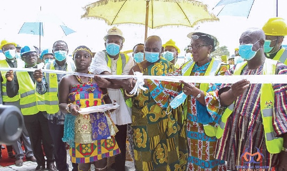 •Professor Oheneba Boakye Adjei (3rd from right), a representative of the Asantehene, being assisted by some dignitaries to innaugurate the treatment plant •Professor Oheneba Boakye Adjei (3rd from right), a representative of the Asantehene, being assisted by some dignitaries to innaugurate the treatment plant