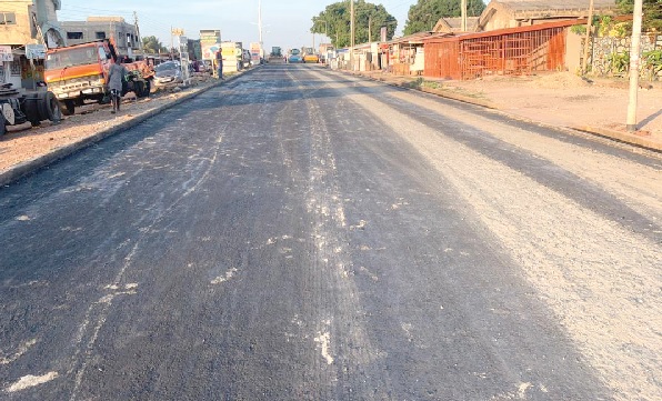 Contractors asphalting the road linking the Tsui Bieoo, Fertilizer and the LeKMA Hospital. Pictures: ESTHER ADJORKOR ADJEI