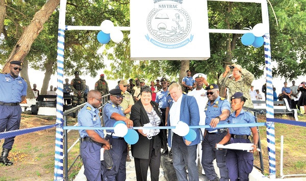 The interceptor boats. Inset:  Virginia Palmer (3rd from left), US Ambassador to Ghana, being assisted by Vice Admiral Amoama (2nd from left) and Tom Norring (4th from left), Danish Ambassador to Ghana, to cut the tape to commission the boats