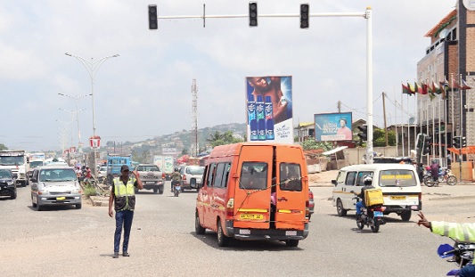 A traffic controller directing traffic at Barn Yard around Awoshie on the N1 road. Picture: ELVIS NII NOI DOWUONA A traffic controller directing traffic at Barn Yard around Awoshie on the N1 road. Picture: ELVIS NII NOI DOWUONA