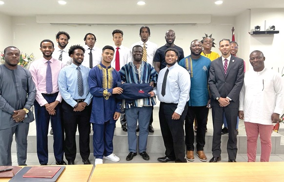 Dr Baffour Awuah (in smock), Director of Technical Coordination at MoH, with some officials and the students Dr Baffour Awuah (in smock), Director of Technical Coordination at MoH, with some officials and the students