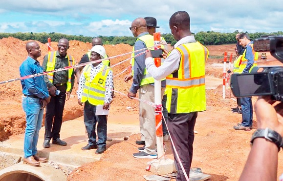 Isaac Afum, Chief Executive Officer of Ashanti Ports Services and leader of the delegation being briefed by some workers on site Isaac Afum, Chief Executive Officer of Ashanti Ports Services and leader of the delegation being briefed by some workers on site