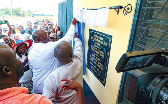 Vice-President Dr Mahamudu Bawumia (arrowed) unveiling a plaque to inaugurate the headquarters building for the newly created Ashanti North Regional Police Command at Mampong in the Ashanti Region. INSET: The headquarters building Vice-President Dr Mahamudu Bawumia (arrowed) unveiling a plaque to inaugurate the headquarters building for the newly created Ashanti North Regional Police Command at Mampong in the Ashanti Region. INSET: The headquarters building