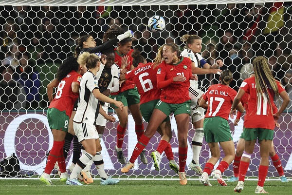 Morocco’s goalkeeper Khadija Er-Rmichi tries to punch the ball away as players collide in front of the Moroccan net, leading to an own goal Morocco’s goalkeeper Khadija Er-Rmichi tries to punch the ball away as players collide in front of the Moroccan net, leading to an own goal