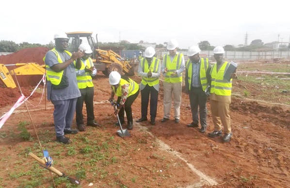 Professor Nana Aba Appiah Amfo (with shovel), Vice-Chancellor of the University of Ghana, cutting the sod for the commencement of the project Professor Nana Aba Appiah Amfo (with shovel), Vice-Chancellor of the University of Ghana, cutting the sod for the commencement of the project