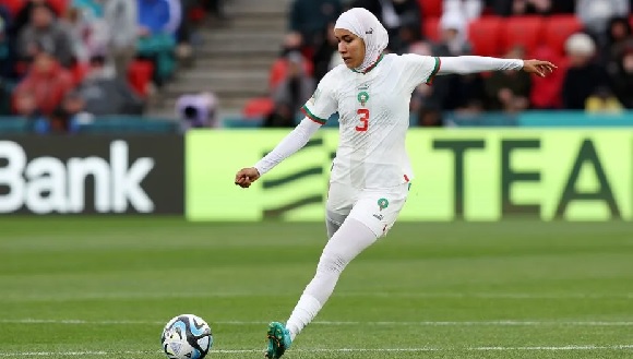 Defender Nouhaila Benzina, playing against South Korea in Morocco's second Women's World Cup match, became the first player to wear a hijab while competing at a senior-level global tournament. Photo by Sarah Reed/Getty Images Defender Nouhaila Benzina, playing against South Korea in Morocco's second Women's World Cup match, became the first player to wear a hijab while competing at a senior-level global tournament. Photo by Sarah Reed/Getty Images
