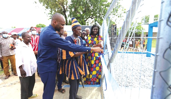 Nicholas Soyiri (left), MCE, Jirapa, Naa Nyuunaa Dakurah III (middle), Divisional Chief of Gbare, and Sylvia Owusu-Ankomah (right) of Guinness Ghana Ltd inaugurating the facility Nicholas Soyiri (left), MCE, Jirapa, Naa Nyuunaa Dakurah III (middle), Divisional Chief of Gbare, and Sylvia Owusu-Ankomah (right) of Guinness Ghana Ltd inaugurating the facility