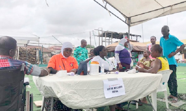Some of the residents of Bukom going through the medical screening Some of the residents of Bukom going through the medical screening