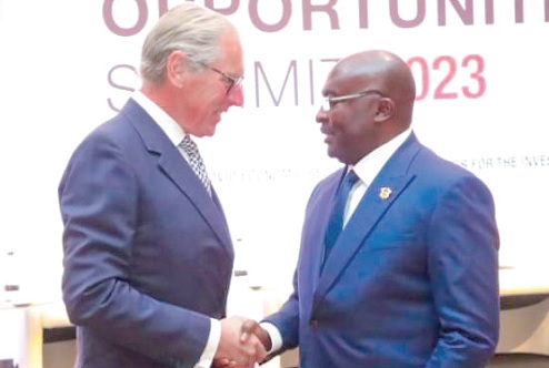 Dr Mahamudu Bawumia exchanging pleasantries with a participant in the summit Dr Mahamudu Bawumia exchanging pleasantries with a participant in the summit