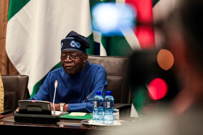 FILE PHOTO: Nigerian President Bola Tinubu looks on as he meets with South African President Cyril Ramaphosa in Cape Town, South Africa, December 3, 2024.REUTERS/Esa Alexander/File Photo FILE PHOTO: Nigerian President Bola Tinubu looks on as he meets with South African President Cyril Ramaphosa in Cape Town, South Africa, December 3, 2024.REUTERS/Esa Alexander/File Photo