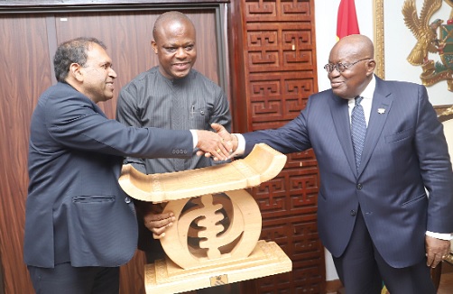President Akufo-Addo presenting a gift to Sugandh Rajaram (left), outgoing Indian High Commissioner to Ghana. With them is Samuel Kumah, Director of Protocol President Akufo-Addo presenting a gift to Sugandh Rajaram (left), outgoing Indian High Commissioner to Ghana. With them is Samuel Kumah, Director of Protocol