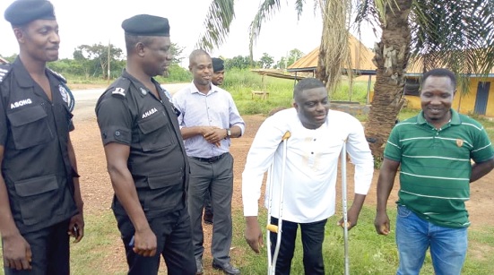 Kofi Vinyo (2nd from right), Businessman; Superintendent Enoch Anaba (2nd from left), Odomase District Police Commander, and Kwasi Agyemang (right), Director of the Kwasi Agyemang Construction Limited, interacting after the sod-cutting ceremony. With them are some policemen and a community ldeader Kofi Vinyo (2nd from right), Businessman; Superintendent Enoch Anaba (2nd from left), Odomase District Police Commander, and Kwasi Agyemang (right), Director of the Kwasi Agyemang Construction Limited, interacting after the sod-cutting ceremony. With them are some policemen and a community ldeader