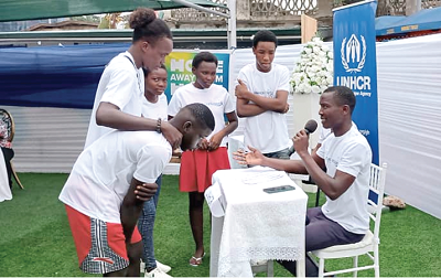 Some refugees performing a drama at the event Some refugees performing a drama at the event
