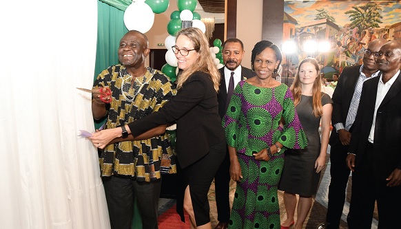 Yaw Frimpong Addo (left), Deputy Minister of Food and Agriculture, being assisted by Vanessa Adams, Vice-President, AGRA, to cut the ribbon to launch the Strategy Plan. With them are Juliette Lampoh-Agroh (3rd from left), Country Manager, Ghana AGRA, and some officials. Picture: EBOW HANSON Yaw Frimpong Addo (left), Deputy Minister of Food and Agriculture, being assisted by Vanessa Adams, Vice-President, AGRA, to cut the ribbon to launch the Strategy Plan. With them are Juliette Lampoh-Agroh (3rd from left), Country Manager, Ghana AGRA, and some officials. Picture: EBOW HANSON