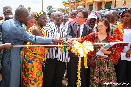 Dr Mahamudu Bawumia (middle) being supported by Nana Oduro Basayiadom, the Chief of Assin Bereku, and Nakamura Toshiyuki, the Special Advisor to President of JICA, to officially inaugurate the road Dr Mahamudu Bawumia (middle) being supported by Nana Oduro Basayiadom, the Chief of Assin Bereku, and Nakamura Toshiyuki, the Special Advisor to President of JICA, to officially inaugurate the road