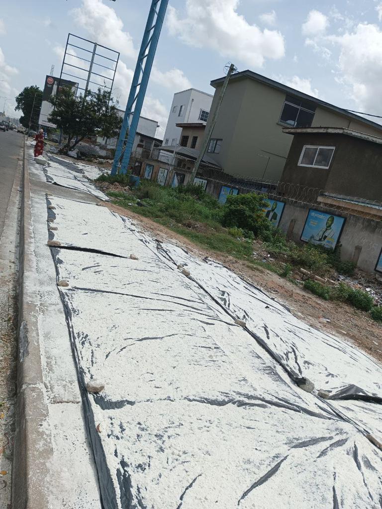 Some of the flour on the pavement on the Kanda Highway in Accra Some of the flour on the pavement on the Kanda Highway in Accra