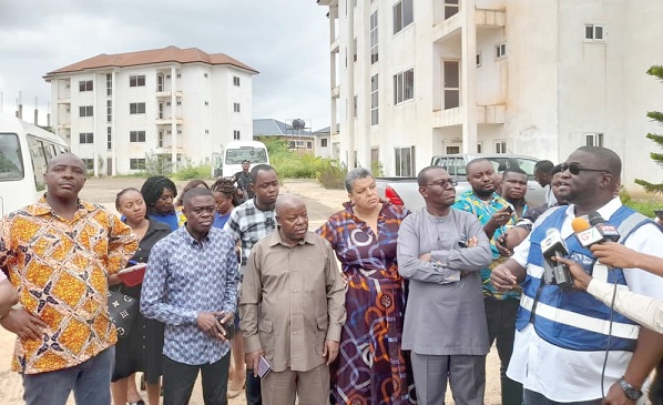 Mr Appiah (right), the MD of the SHC, briefing the Works and Housing Committee members at the Little London apartments in Adentan Mr Appiah (right), the MD of the SHC, briefing the Works and Housing Committee members at the Little London apartments in Adentan