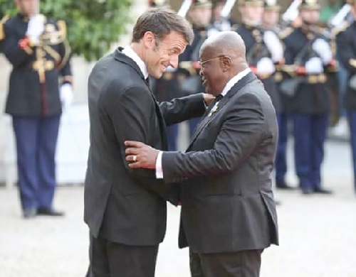 President Akufo-Addo (right) being welcomed by Emmanuel Macron, the President of France President Akufo-Addo (right) being welcomed by Emmanuel Macron, the President of France