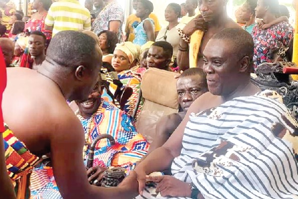 Oseadeeyo Agyemang Badu II (right), President of the Bono Regional House of Chiefs, exchanging pleasantries with Ansu Kumi (back to camera), the Sunyani Municipal Chief Executive Oseadeeyo Agyemang Badu II (right), President of the Bono Regional House of Chiefs, exchanging pleasantries with Ansu Kumi (back to camera), the Sunyani Municipal Chief Executive