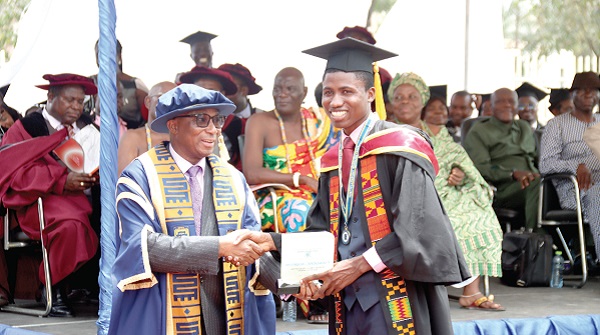 Wilfred Kwabena Anim-Odame (left), Council Chair, Accra Technical University, presenting the Overall Best Graduating BTECH Student award to Addison Fiawogbe. Picture: ELVIS NII NOI DOWUONA Wilfred Kwabena Anim-Odame (left), Council Chair, Accra Technical University, presenting the Overall Best Graduating BTECH Student award to Addison Fiawogbe. Picture: ELVIS NII NOI DOWUONA