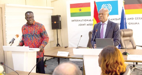 • Ignatius Baffour - Awauh (left) with Gilbert F. Houngbo, Director-General of ILO