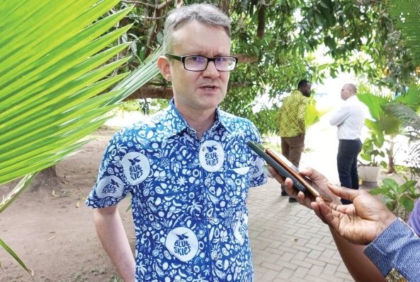 • Simon Derrick, Head of Sustainability at Blues Skies Factory and Juice Bar, engaging the media after the discussion • Simon Derrick, Head of Sustainability at Blues Skies Factory and Juice Bar, engaging the media after the discussion