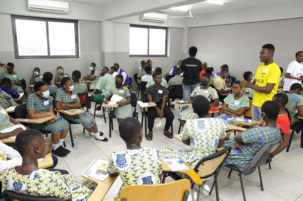 Trained volunteers interacting with students at a session Akua Essah Child In Tech