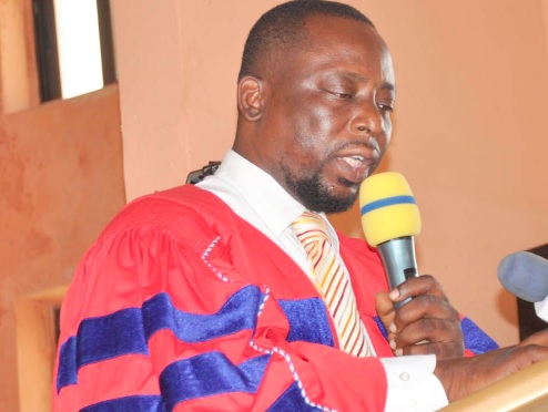 • INSET: Dr Dickson Tsey, Principal of Amedzofe College of Education, administering the matriculation oath • INSET: Dr Dickson Tsey, Principal of Amedzofe College of Education, administering the matriculation oath