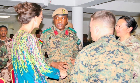 • Col Richard Kainyi Mensah (2nd from left), Commander of Combined Joint Multinational Headquarters Exercise FLINTLOCK 2023 interacting with some of the participants in the opening address. Among them is Harriet Thompson (left), British High Commissioner to Ghana • Col Richard Kainyi Mensah (2nd from left), Commander of Combined Joint Multinational Headquarters Exercise FLINTLOCK 2023 interacting with some of the participants in the opening address. Among them is Harriet Thompson (left), British High Commissioner to Ghana