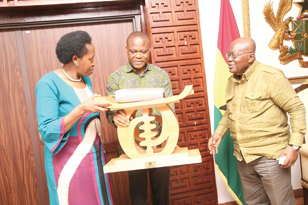 President Akufo-Addo presenting a gift to Dr Aissa Kirabo Kacyira (left), the outgoing Rwandan High Commissioner to Ghana. With them is Samuel Kumah, Director of Protocol. Pictures: SAMUEL TEI ADANO President Akufo-Addo presenting a gift to Dr Aissa Kirabo Kacyira (left), the outgoing Rwandan High Commissioner to Ghana. With them is Samuel Kumah, Director of Protocol. Pictures: SAMUEL TEI ADANO