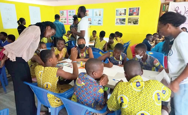 • Some female members of the GIA having a design charrette with some pupils of the basic schools International Women’s Day - Girls advised to study architecture
