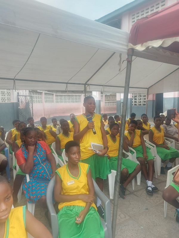 One of the students answering a question PwC IWD Jamestown