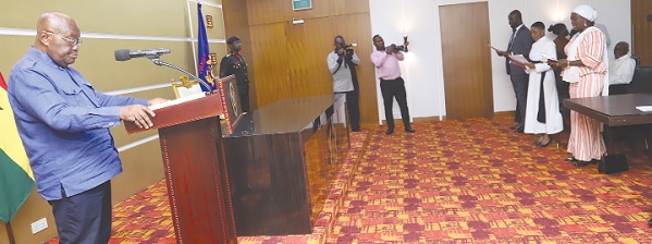 • Members of the EC swearing the oath of secrecy at the Jubilee house • Members of the EC swearing the oath of secrecy at the Jubilee house