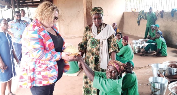 • Harriet Williams (left), Second Secretary at the Australian High Commission, receiving shea butter from some of the beneficiaries • Harriet Williams (left), Second Secretary at the Australian High Commission, receiving shea butter from some of the beneficiaries