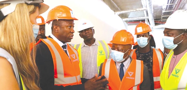 • INSET: Kwaku Agyemang-Manu (middle), Minister of Health, being conducted round the centre under construction at the Korle Bu Teaching Hospital • INSET: Kwaku Agyemang-Manu (middle), Minister of Health, being conducted round the centre under construction at the Korle Bu Teaching Hospital
