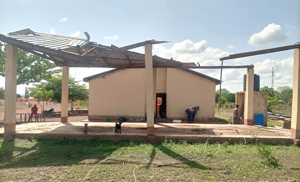 The structures of the Ghana National Fire Service at Bimbila and a mast (Inset) belonging to a local radio station destroyed by the rainstorm