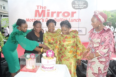 Doreen Hammond (2nd from left), Editor, The Mirror, being assisted by the Tagoe Sisters and Diana Asamoah (left) to cut the cake. Looking on is Samira Bawumia (right), wife of the Vice-President Doreen Hammond (2nd from left), Editor, The Mirror, being assisted by the Tagoe Sisters and Diana Asamoah (left) to cut the cake. Looking on is Samira Bawumia (right), wife of the Vice-President